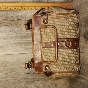 Vintage women's faux leather and textured fabric small Handbag.